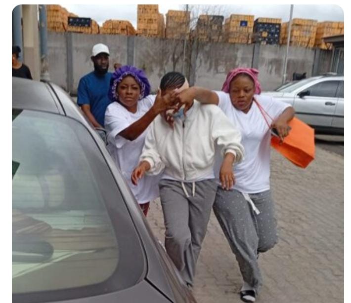 Comfort (middle) was released from the correctional centre on Wednesday.